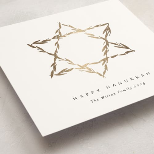 This is a ink hanukkah cards with foil pressed by Becky Nimoy called star of leaves printing on signature in standard