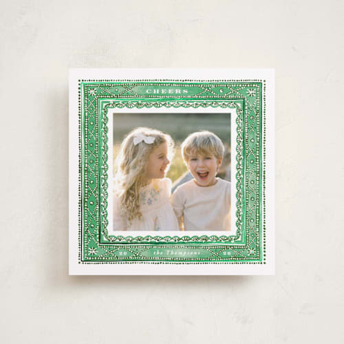 This is a juniper foil pressed holiday cards with foil pressed by Anastasia Makarova called dots and snowflakes printing on recycled smooth signature in square