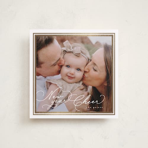 This is a snow foil pressed holiday cards with foil pressed by Tamara Hilje called goldie printing on recycled smooth signature in square