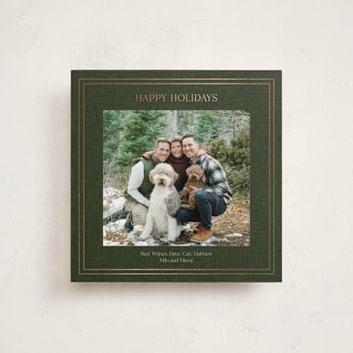 This is a pine foil pressed holiday cards with foil pressed by Tina Faselli called traditional linen printing on recycled smooth signature in square