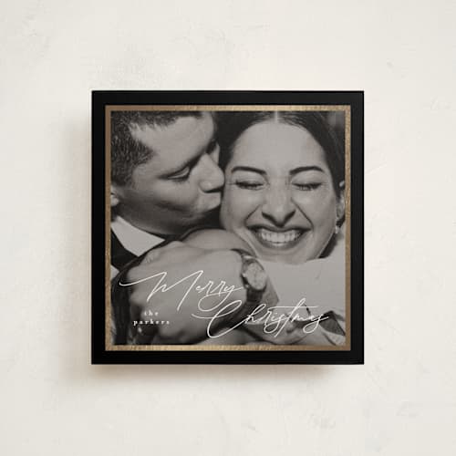 This is a licorice foil pressed holiday cards with foil pressed by Tamara Hilje called holiday soneto printing on recycled smooth signature in square