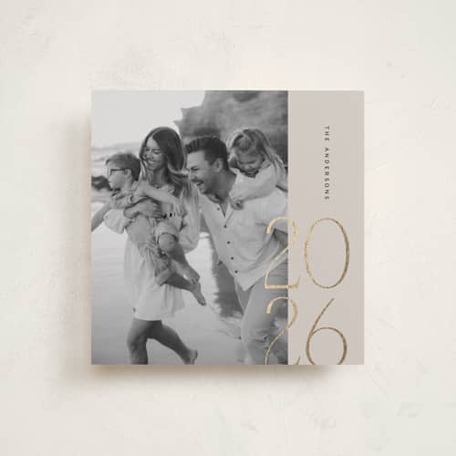 This is a fog foil pressed holiday cards with foil pressed by Ana Sharpe called year in display printing on recycled smooth signature in square