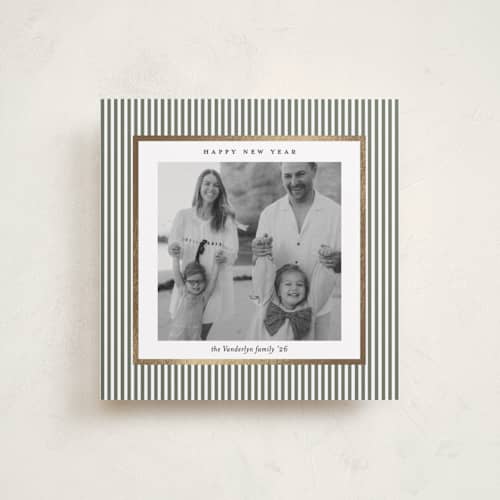 This is a sage green foil pressed holiday cards with foil pressed by Lucrecia Caporale called striped frame printing on recycled smooth signature in square