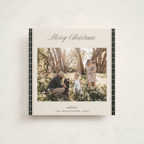 This is a wreath holiday photo cards with standard by Lottie Aldarwish called the tartan one printing on recycled smooth signature in square