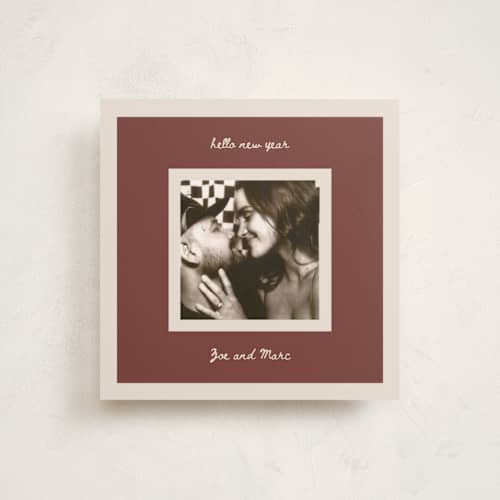 This is a maroon holiday photo cards with standard by Gwen Bedat called hello printing on recycled smooth signature in square
