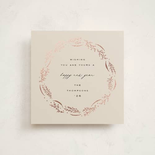 This is a eggnog foil pressed holiday cards with foil pressed by Amy Kross called wrapped wreath printing on signature in square
