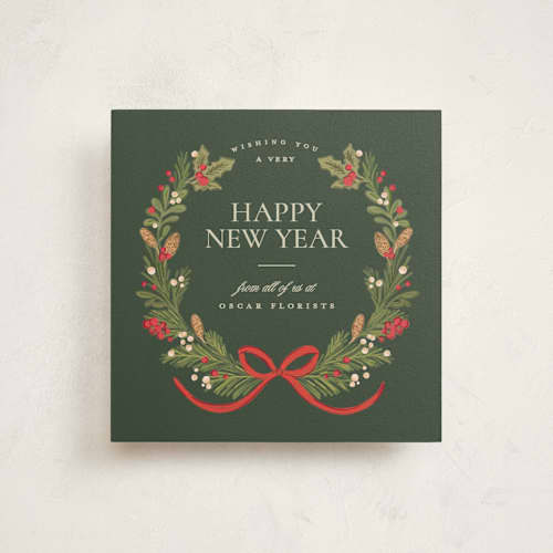 This is a pine holiday photo cards with standard by Creo Study called holiday wreath printing on signature in square