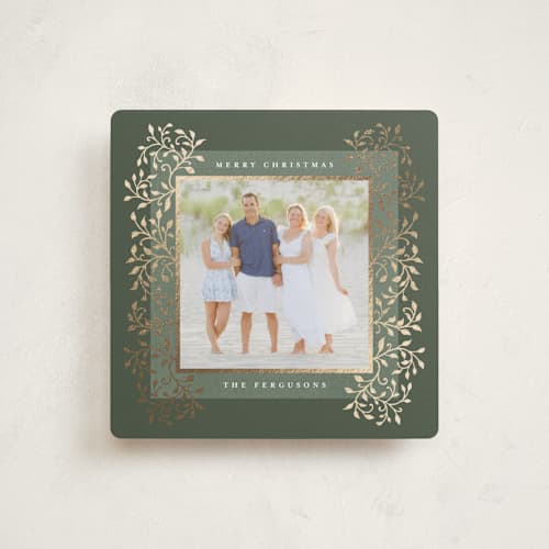 This is a sage foil pressed holiday cards with foil pressed by Tamara Hilje called laurel printing on recycled smooth signature in square