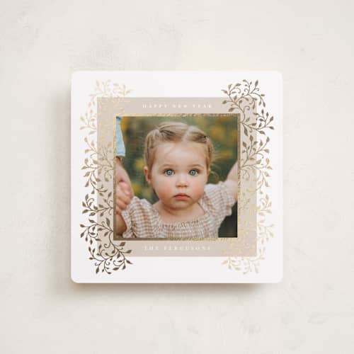 This is a marshmallow foil pressed holiday cards with foil pressed by Tamara Hilje called laurel printing on recycled smooth signature in square