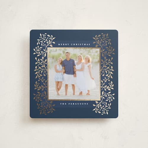 This is a navy foil pressed holiday cards with foil pressed by Tamara Hilje called laurel printing on recycled smooth signature in square
