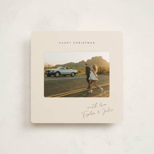 This is a latte foil pressed holiday cards with foil pressed by Kamala Nahas called merry slide printing on recycled smooth signature in square