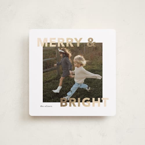 This is a snowflake foil pressed holiday cards with foil pressed by Angela Thompson called merry bright printing on recycled smooth signature in square