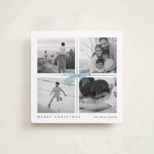 This is a night foil pressed holiday cards with foil pressed by Brooke Chandler called square present printing on recycled smooth signature in square