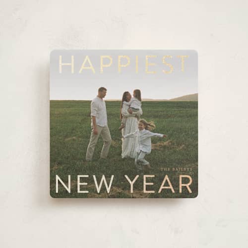 This is a champagne foil pressed holiday cards with foil pressed by Angela Thompson called gilded type printing on recycled smooth signature in square