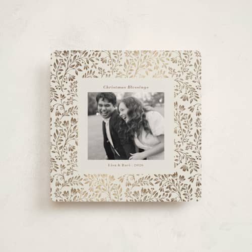 This is a vanilla foil pressed holiday cards with foil pressed by Anna Black called leafy pattern printing on recycled smooth signature in square