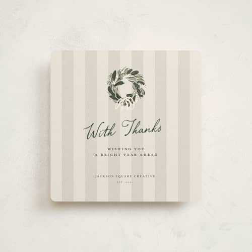This is a taupe holiday photo cards with standard by Lucrecia Caporale called vintage wreath printing on signature in square