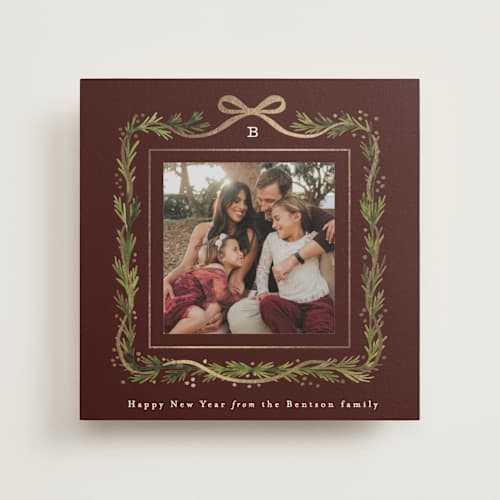 This is a mocha photo mount holiday cards with foil pressed by Alethea and Ruth called garland border printing on recycled in photo_mount