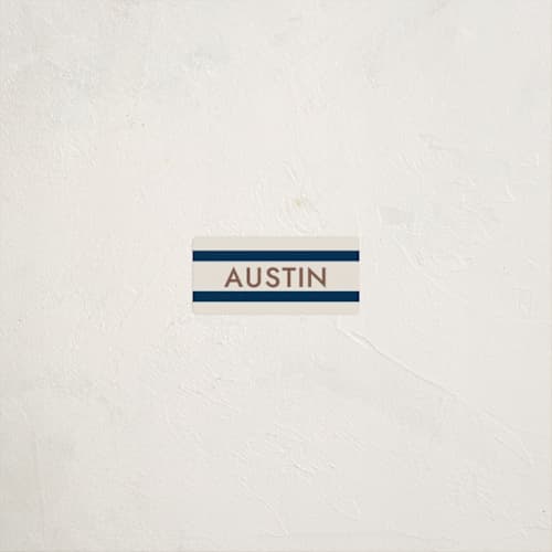 This is a navy name labels with standard by Megan Davis called montauk printing on waterproof sticker paper in sticker