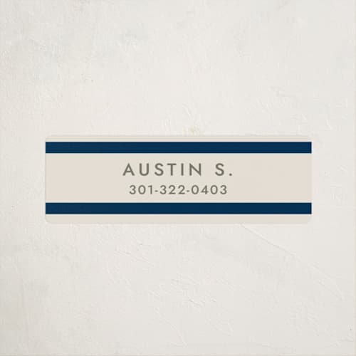 This is a navy name labels with standard by Megan Davis called montauk printing on waterproof sticker paper in sticker