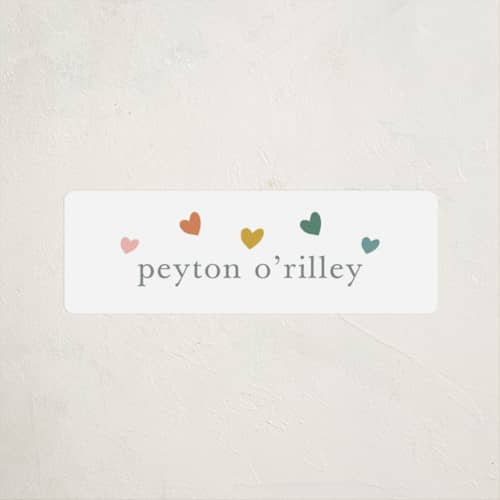 This is a rainbow name labels with standard by Stacey Meacham called rainbow hearts printing on waterproof sticker paper in sticker