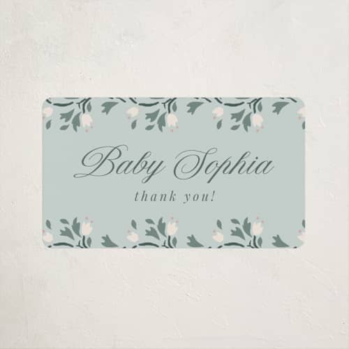 This is a sage baby shower favor labels with standard by Ana de Sousa called little love story printing on uncoated sticker paper in sticker