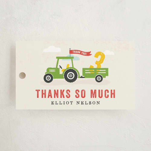 This is a cream kids gift tags with standard by Michelle Taylor called party parade printing on signature in tag