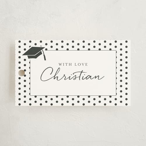 This is a snow graduation tags with standard by Deynaaz Daraei called patchwork printing on signature in tag