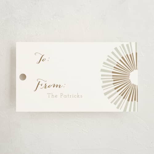 This is a golden gift tags with standard by Kelly Ventura called shimmer printing on signature in tag