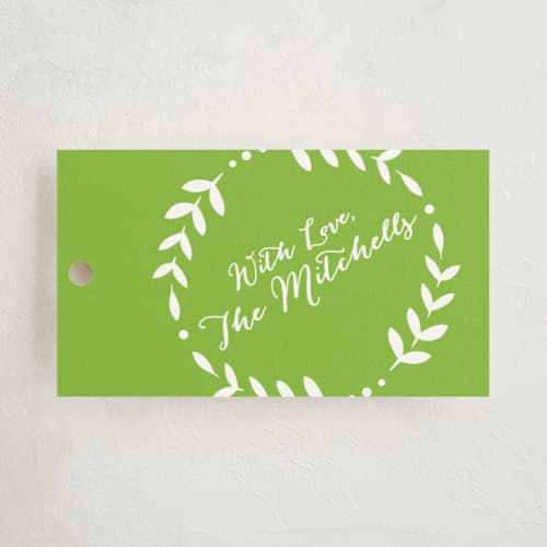 This is a lime gift tags with standard by Erin Deegan called stamped linen printing on signature in tag
