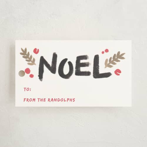 This is a gold gift tags with standard by Kristen Smith called bold brush holiday printing on signature in tag