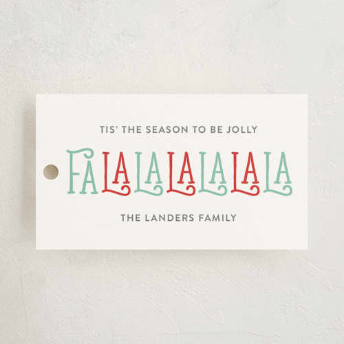 This is a frost gift tags with standard by Dennis Smith called falalalalalala printing on signature in tag