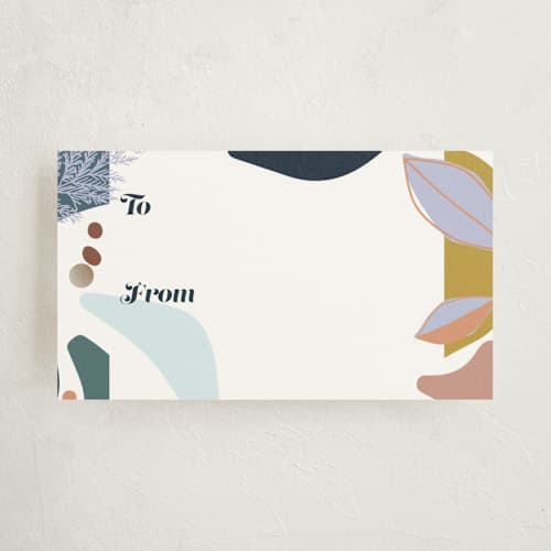 This is a turquoise gift tags with standard by Stephanie C Martinez called abstract christmas at sea printing on signature in tag