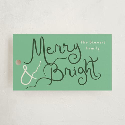 This is a fir gift tags with standard by Megan Davis called winter bright printing on signature in tag