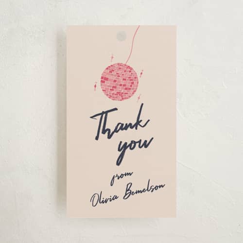 This is a fuchsia graduation tags with standard by Sarah Rosenthal called sparkle and rhythm celebration printing on signature in tag