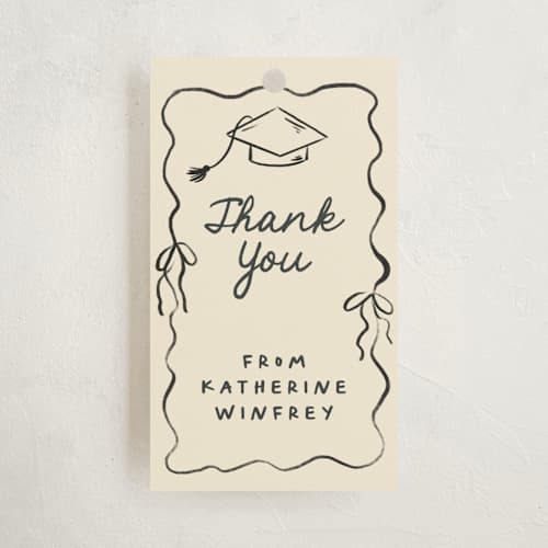 This is a noir graduation tags with standard by Creo Study called trendsetter printing on signature in tag