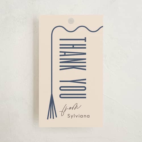 This is a elan graduation tags with standard by letterfix called deneb printing on signature in tag