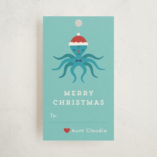 This is a turquoise gift tags with standard by Bob Daly called under the sea christmas printing on signature in tag