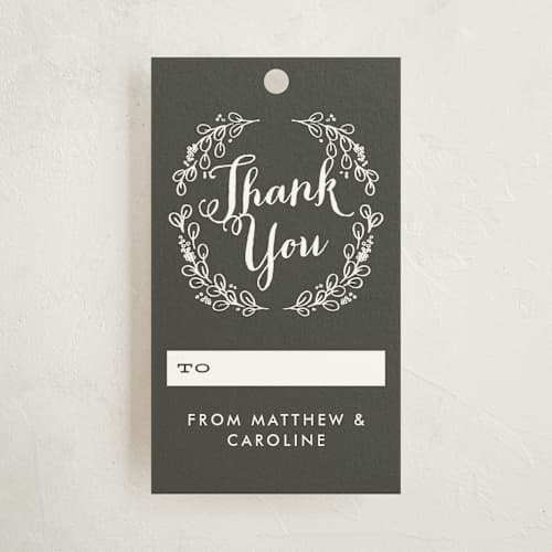 This is a charcoal gift tags with standard by Alethea and Ruth called chalkboard wreath printing on signature in tag