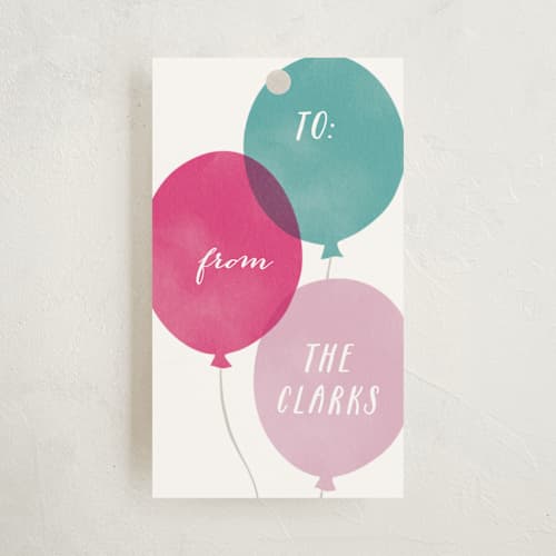 This is a magenta gift tags with standard by Hooray Creative called birthday balloons printing on signature in tag