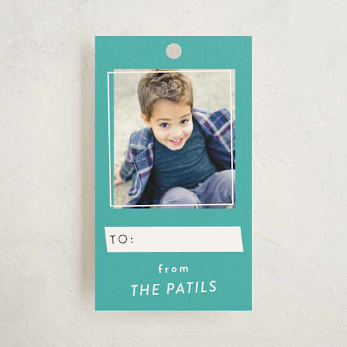 This is a aqua gift tags with standard by Iwona K called overlapping printing on signature in tag