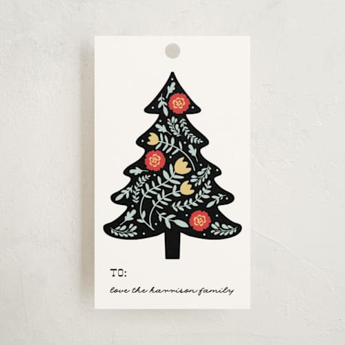 This is a snow gift tags with standard by Angela Thompson called folk floral trees printing on signature in tag