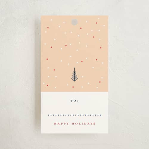 This is a peach gift tags with standard by Katy Shen called tiny christmas printing on signature in tag