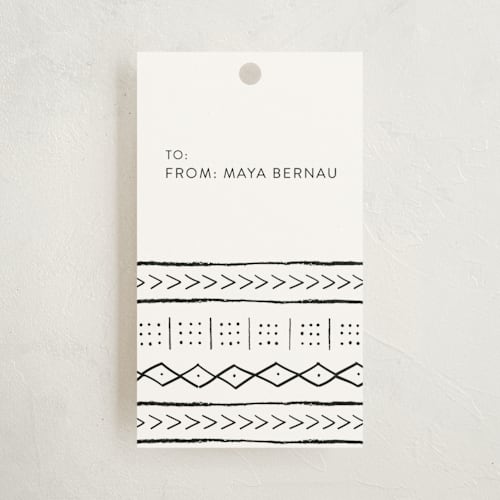 This is a midnight gift tags with standard by Erin Deegan called mud cloth tribe printing on signature in tag