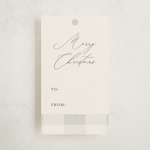 This is a buttercream gift tags with standard by Carolyn Nicks called gingham stars printing on signature in tag
