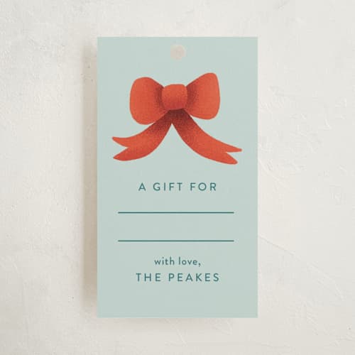 This is a sky blue gift tags with standard by Ana Peake called bark! the herald angel sing printing on signature in tag