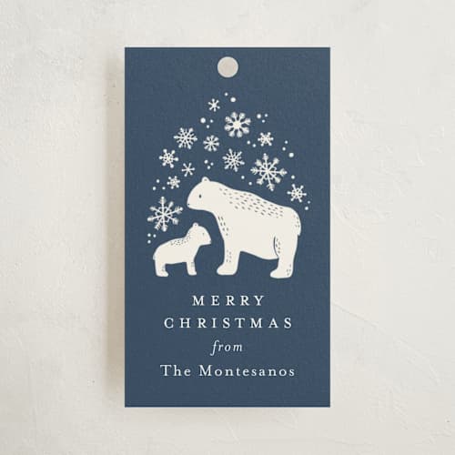 This is a blue spruce gift tags with standard by Kristen Knechtel called winter woodland printing on signature in tag