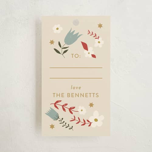 This is a charcoal gift tags with standard by Kiley Bennett called good tidings printing on signature in tag