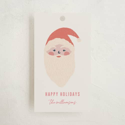 This is a cream gift tags with standard by Rebecca Humphreys called holiday icons printing on signature in tag