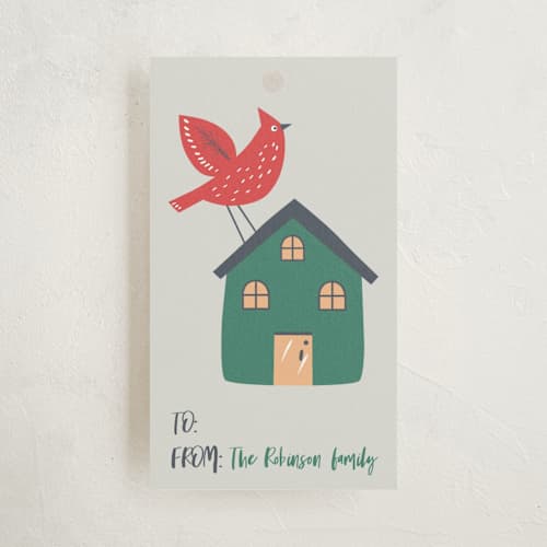 This is a pine gift tags with standard by Tatjana Koraksic called bird, house and tree printing on signature in tag