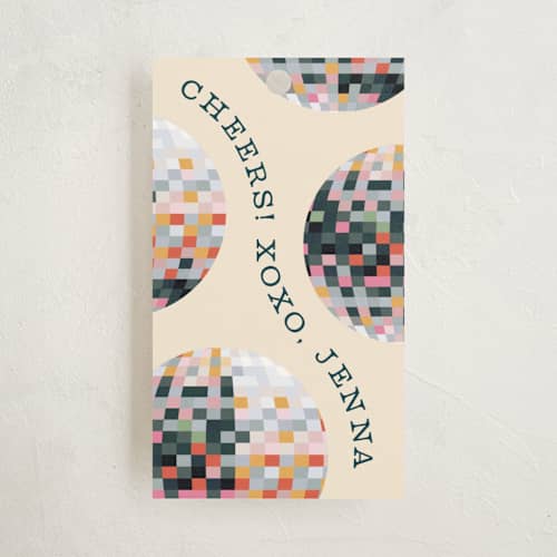 This is a champagne gift tags with standard by Pixel and Hank called new year disco printing on signature in tag